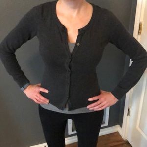 Cute light weight cardigan in charcoal grey.